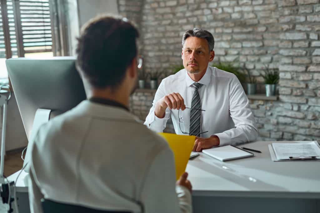 man hiring an accountant conducting an interview