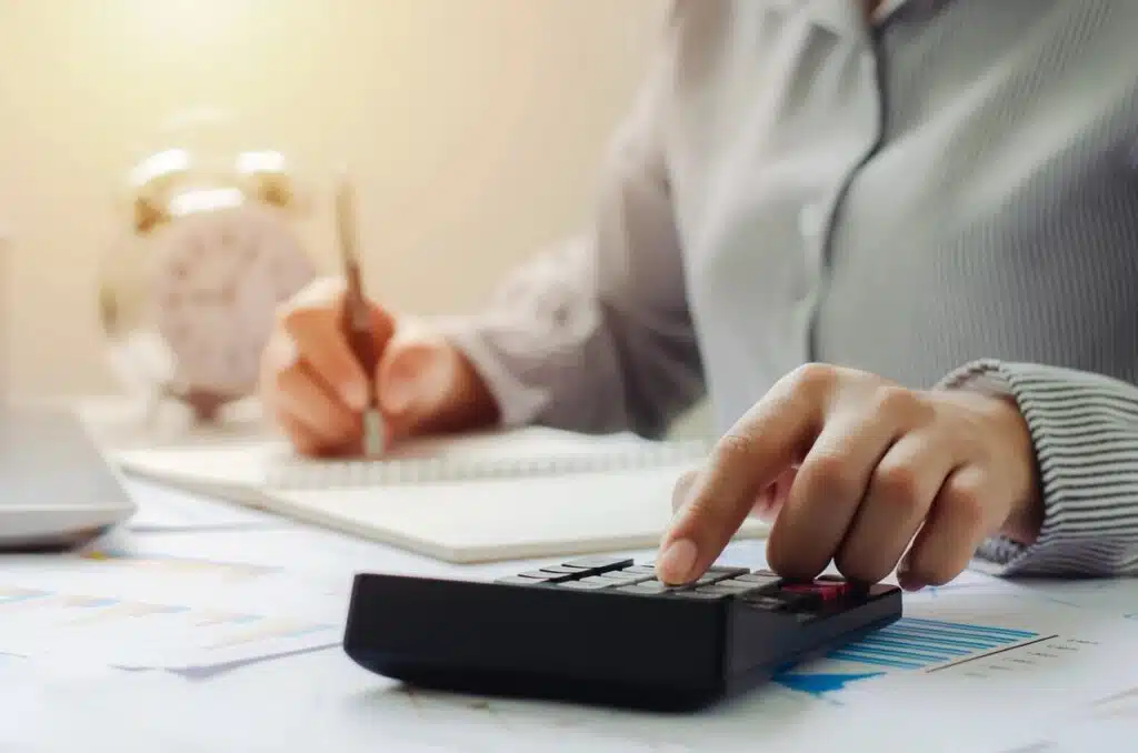 A man preparing his taxes for bookkeeping